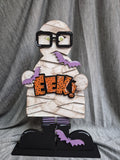 EEK! Mummy Halloween tabletop decoration with purple bats and big glasses